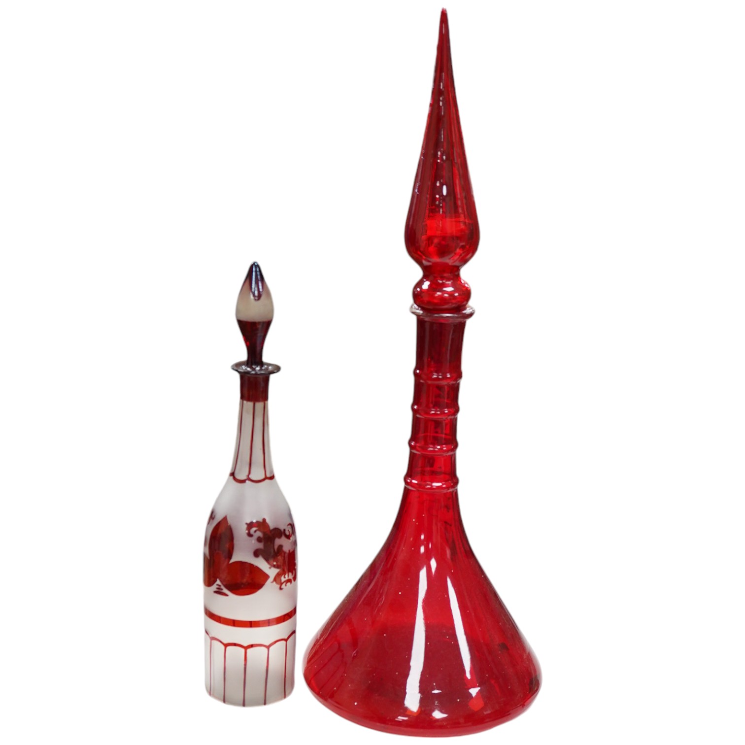 A Bohemian style large decanter and a smaller overlay decanter and stopper, tallest 57cm high. Condition - fair